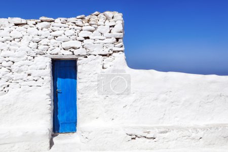 Mykonos Blue door in Whitewashed Wall