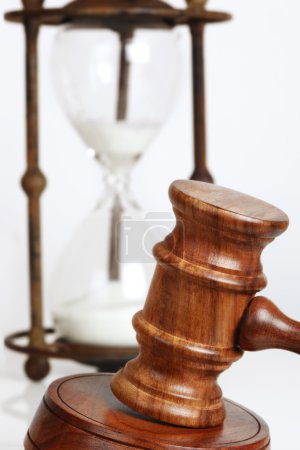 Gavel with Hourglass Behind