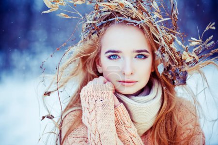 Young woman winter fashion portrait.