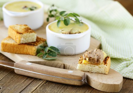 Homemade chicken liver pate and piece of bread
