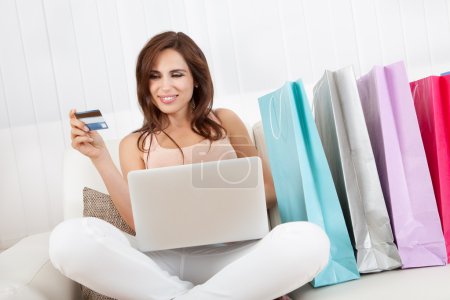Smiling Female Shopping Online