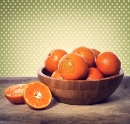 Tangerines in wooden bowl 