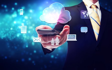Business man holding a mobile phone with cloud connection theme