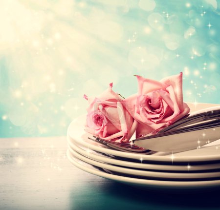 Dinner plates with pink roses