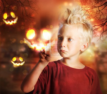 Boy Touching Halloween Ghost