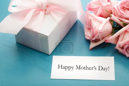 Mothers day card with gift box and roses