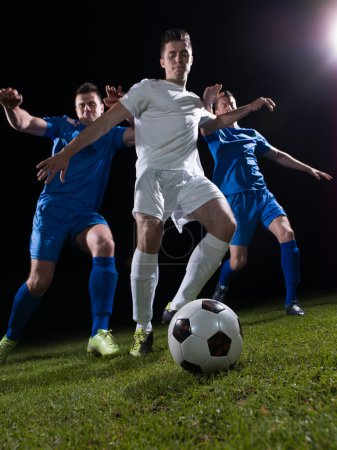 Soccer player doing kick with ball