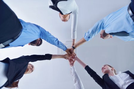 business people group joining hands