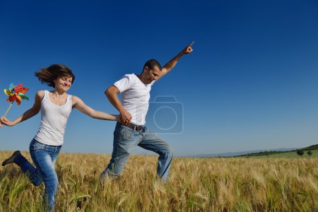 Happy couple in wheat field