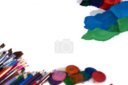Colorful palette and paint brushes