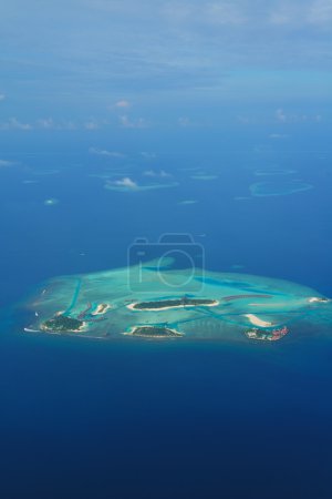 View of tropaical island from helicopter