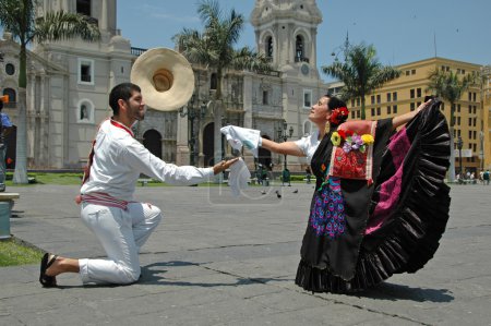 Marinera dancers in front of the cathedral in Lima Peru