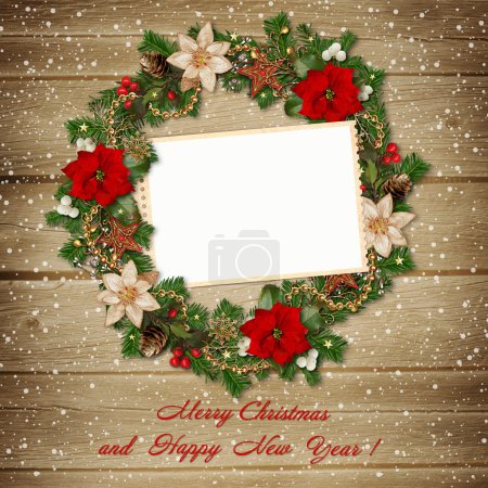 Christmas wreath with frame on wooden background