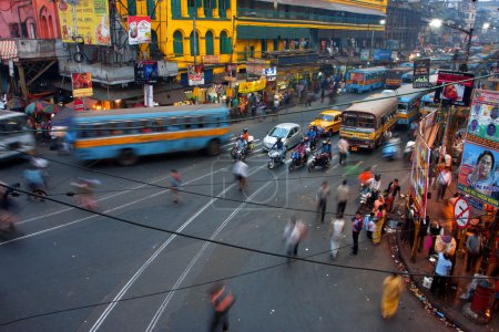 Street traffic blurred in motion at evening in the Indian city