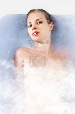 Woman in hot bathtab