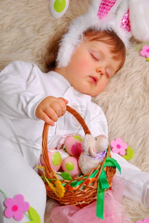 sleeping baby in easter bunny costume