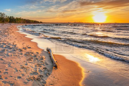 Sunset on the beach at Baltic Sea