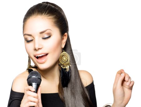 Singing Woman. Beauty Woman with Microphone