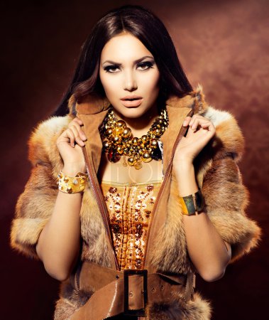 Beauty Fashion Model Girl in Fox Fur Coat