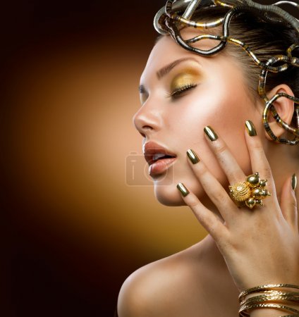 Golden Makeup. Fashion Girl Portrait