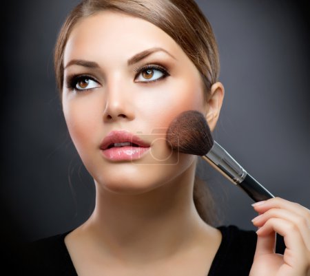 Makeup. Applying Make-up Cosmetics Brush. Perfect Make-up