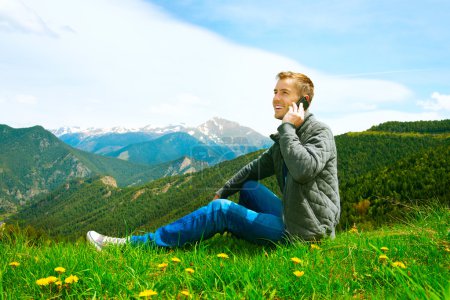 Man talking on cellphone outdoor.