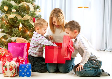 Happy Children with Christmas gifts
