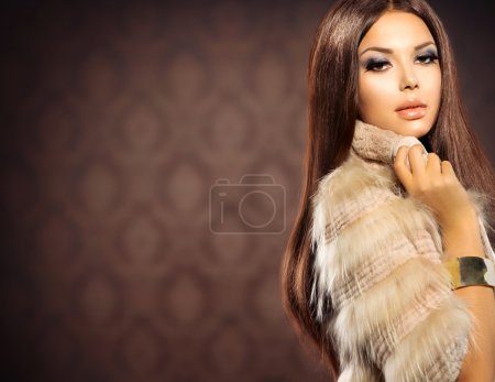 Beauty Fashion Model Girl in Fox Fur Coat