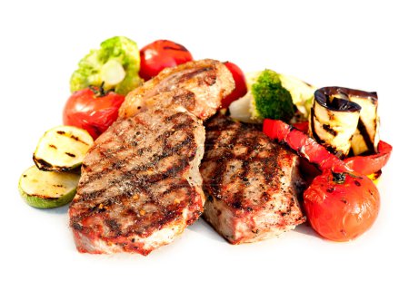 Grilled Beef Steak with Vegetables over White Background