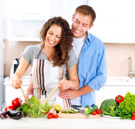 Happy Couple Cooking Together. Dieting. Healthy Food