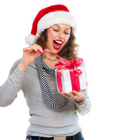 Beautiful Young Woman Opening Christmas Gift Box. Surprised Girl
