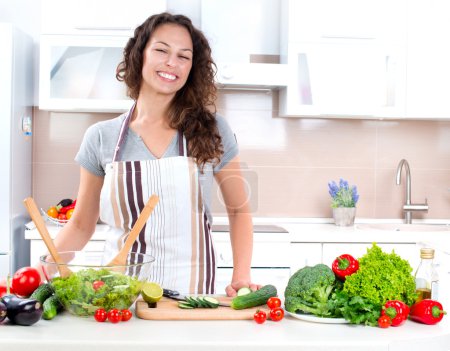 Young Woman Cooking. Healthy Food