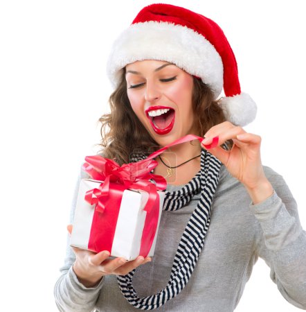 Beautiful Young Woman Opening Christmas Gift Box. Surprised Girl