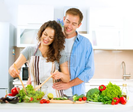 Happy Couple Cooking Together. Dieting. Healthy Food 