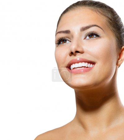Teeth Whitening. Beautiful Smiling Young Woman Portrait
