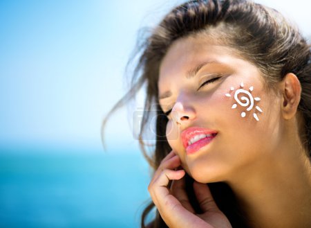Girl Applying Sun Tan Cream