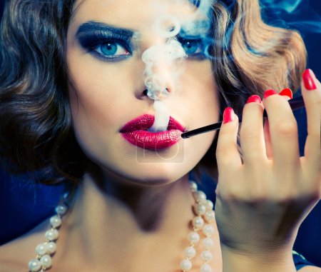 Smoking Retro Woman Portrait. Beauty Girl with Mouthpiece