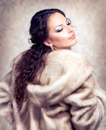 Fashion Beautiful Woman in Luxury Fur Mink Coat