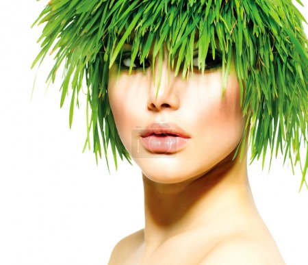 Beauty Spring Woman with Fresh Green Grass Hair. Summer Nature