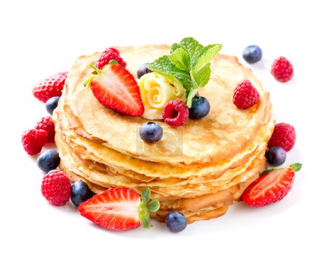 Pancake with Berries. Pancakes Stack over White