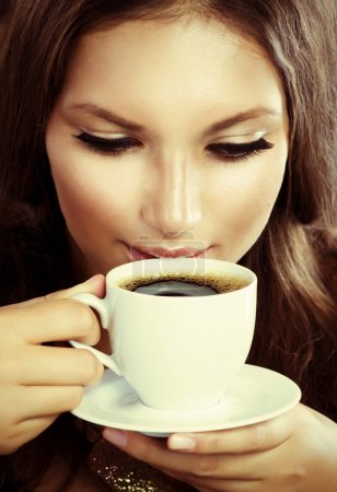 Beautiful Girl Drinking Coffee or Tea