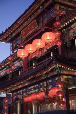 Traditional Chinese building illuminated at night