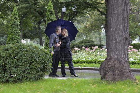 Mature couple walking in a park