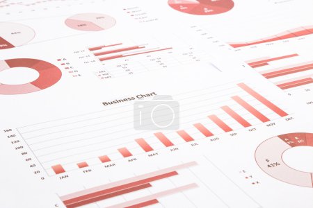 red business charts, graphs, annual report and summarizing backg