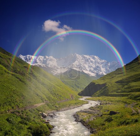 Mountain with rainbow
