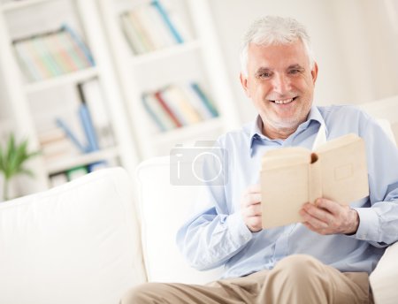 Senior Man Reading a Book