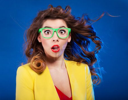 Colorful portrait of an attractive surprised girl