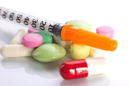 medication and insulin syringe