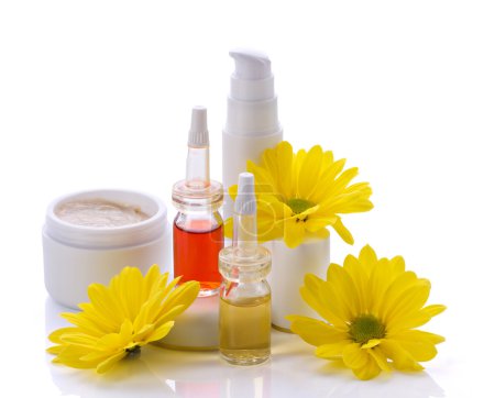 cosmetics products and flowers