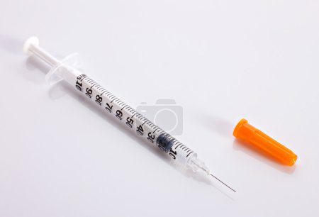 Plastic insulin syringe